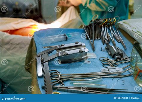 The Surgeon In The Instruments Of Surgery In Operating Room Stock Image