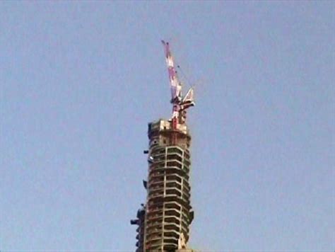 Crane On Top Of Burj Khalifa Photo