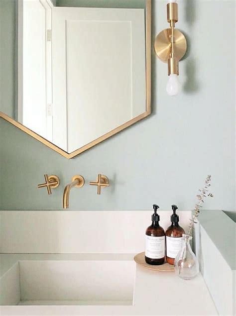 It's easy for the room to feel like a place where function stands high over form, but that doesn't mean a few extra touches can't make it feel extra. West Elm | Green bathroom, Bathroom design, Small bathroom