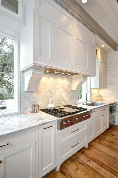 The two linen cabinet doors with drawer pulls open up to reveal two interior shelves that are adjustable. HGTV loves this coastal-style kitchen with high ceilings ...