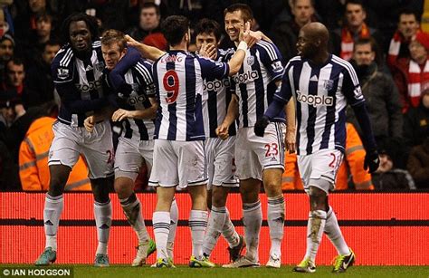 The west brom and liverpool players react to the goal. Liverpool 0 West Brom 2 - match report: Gareth McAuley and ...