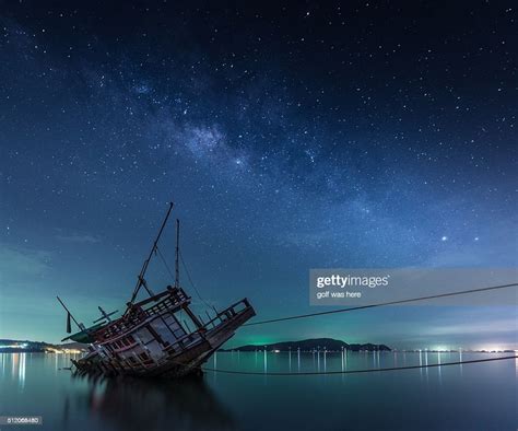 Milky Way Galaxy Over A Boat High Res Stock Photo Getty Images