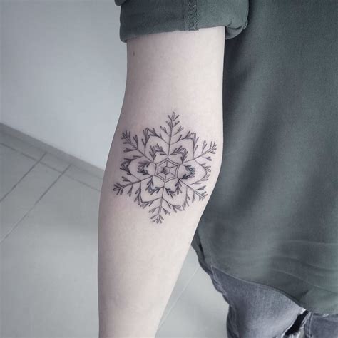Small tattoos are perfect alternatives for people who love the idea of body art but do not want to overdo it. 20 Simple and Beautiful Snowflake Tattoos