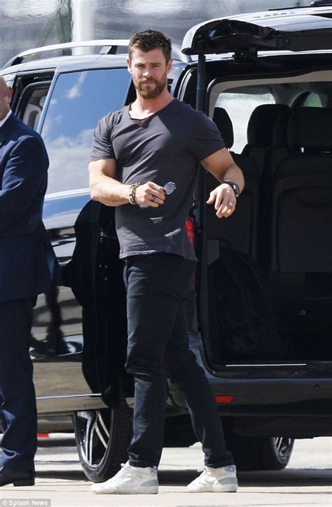 Thor S Chris Hemsworth Performs Stretches After Stepping Off A Plane In Melbourne Daily Mail