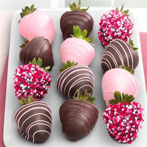 Chocolate Covered Strawberries Are Arranged On A White Plate With Pink Sprinkles