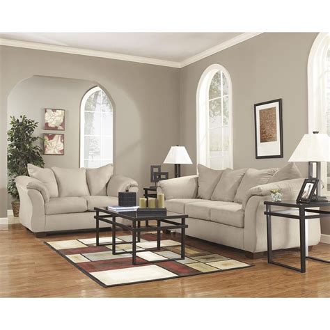 The company provides furniture for living and dining rooms, bathrooms, bedrooms, offices and outdoor space. Signature Design by Ashley Darcy Sofa and Loveseat in ...