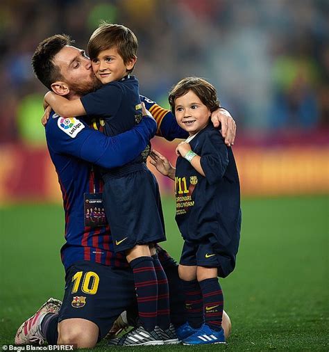 lionel messi enjoys special moment with his sons on pitch after barcelona s la liga title