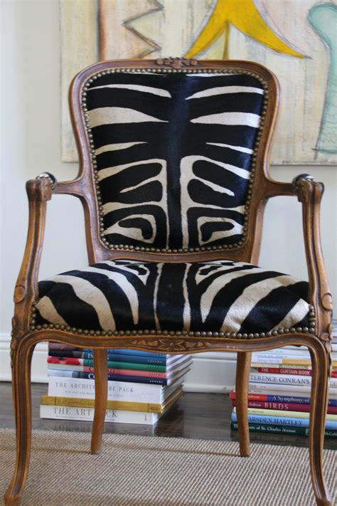 Everyone in different styling captivates and creates a unique whole. beautiful chair covered in old zebra hide rug | Animal ...