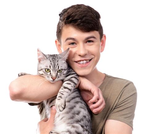 Premium Photo Handsome Young Man With Cute Cat Isolated On White