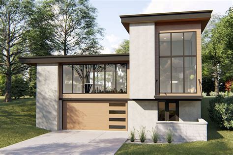 Striking Modern House Plan With Courtyard And Drive Under Garage