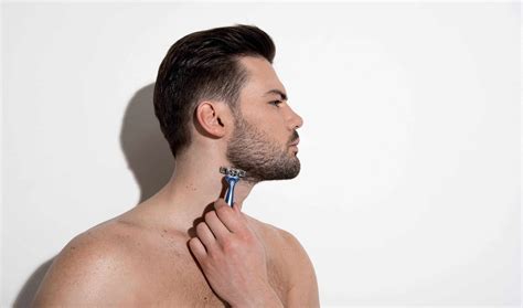 Adjust the clippers again at one to two settings lower and clip the hair neckline by your adam's apple. How to Trim & Shape The Perfect Beard Neckline in 11 ...
