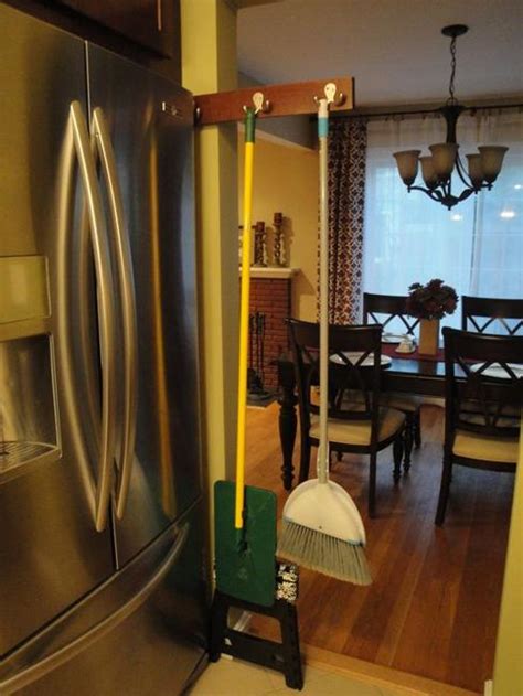 They also work great in the clothes closet to hang belts or umbrellas. Sliding Home Organizers for Mops and Brooms, Space Saving ...
