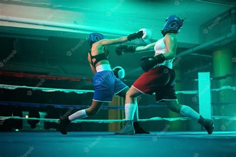 Free Photo Qualified Female Boxers Boxing In Gym Two Young Girls In
