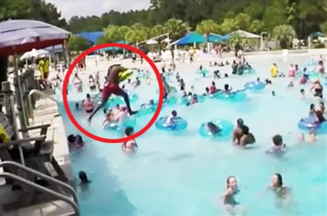 Watch Hero Lifeguard Leaps Into Wave Pool To Save Girl From Drowning Daily Star