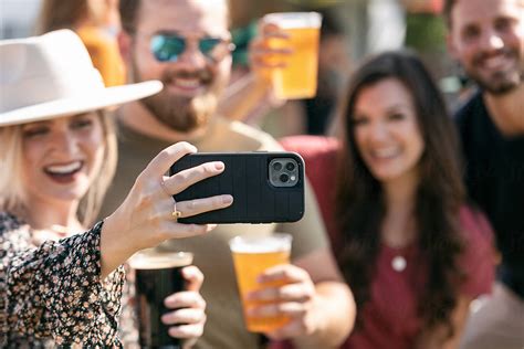 Beer Friends Take Selfie Together By Stocksy Contributor Sean Locke Stocksy