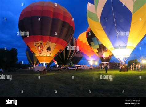 Hot Air Balloon Glow With Flames At A Connecticut Balloon Festival
