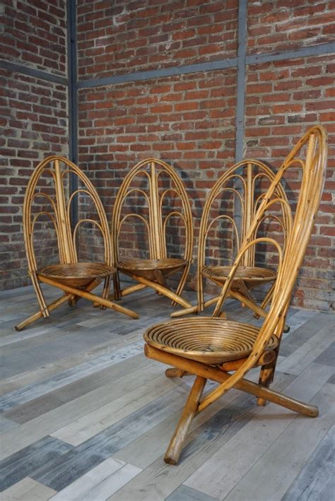 An original rattan lounge chair designed by architect alan fuchs and produced by uluv in 1961 for an experimental housing project in prague. Rattan and Wooden Lounge and Outdoor Four Armchairs For ...