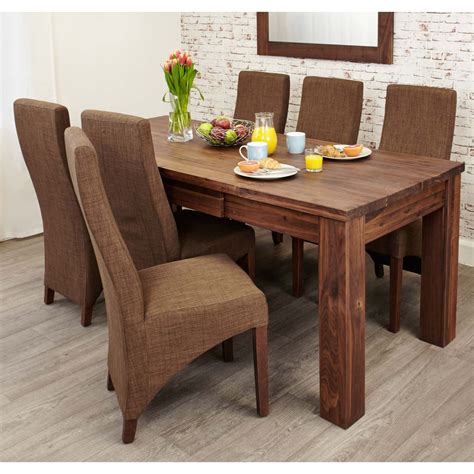 Design ideas for a contemporary dining room in london with white walls and grey floors. Linea solid walnut furniture large dining room extending ...