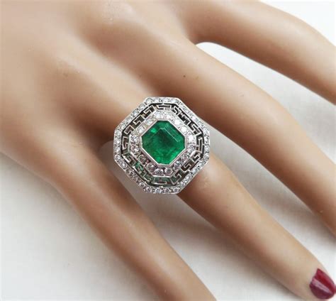 Channeling art deco vibes, this bespoke, vintage inspired emerald cut engagement ring is flanked by three baguette diamonds on each side. Gorgeous Art Deco Platinum 3ct Emerald And Diamond Vintage ...