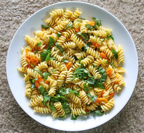 Fusilli Pasta With Cherry Tomatoes Basil Leaves By Archanas Kitchen