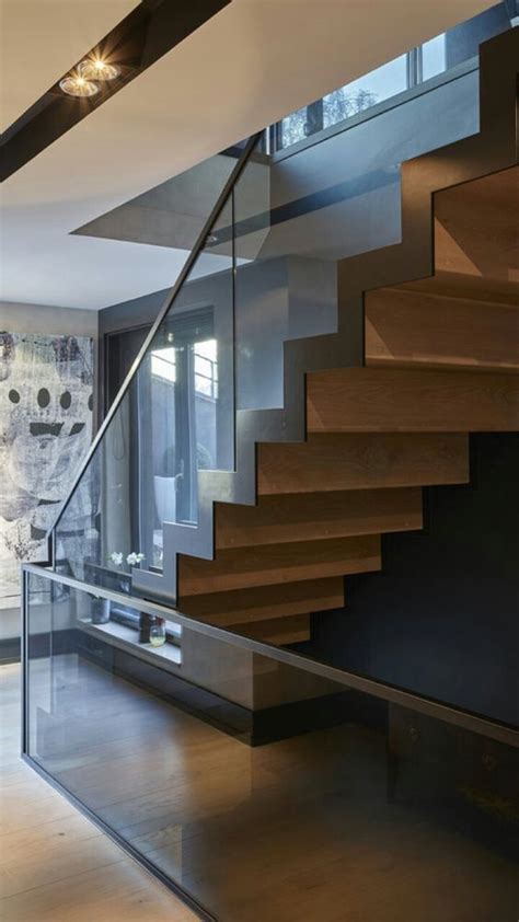 This Zigzag Staircase With Closer Riser Glass Balustrade Steel