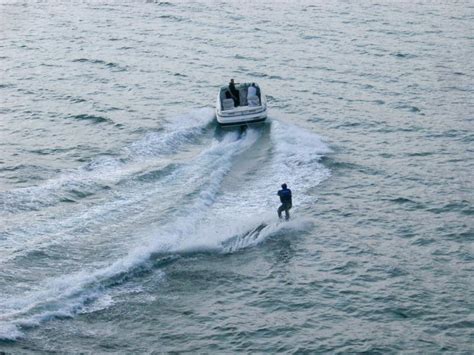 Free Stock Photo Of Speedboat And Skier In A Wetsuit Photoeverywhere