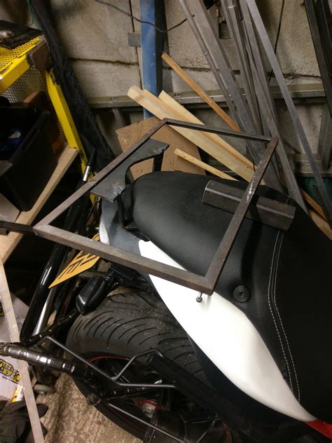 If that's all you plan to haul, you don't need to modify your factory rack. Homemade speed triple luggage rack - Triumph Forum ...