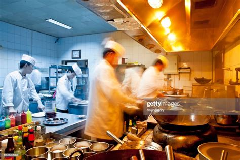 Motion Chefs Of A Restaurant Kitchen High Res Stock Photo Getty Images