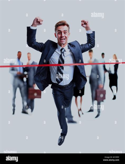 Happy Businessman Running Through Finishing Line Stock Photo Alamy