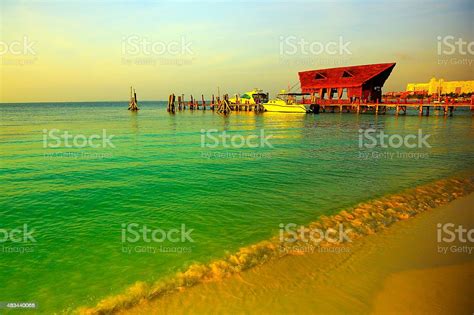 Bungalow Palapa Pier And Ships Idyllic Caribbean Shore Sunset Stock