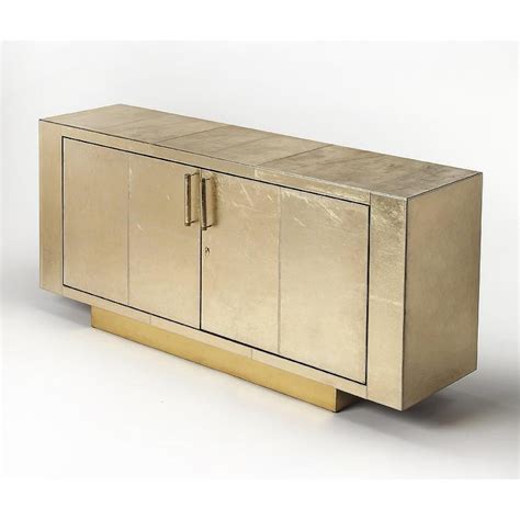 Complete your dining room with a new sideboard or buffet table! Luton Gold Leather Buffet Table