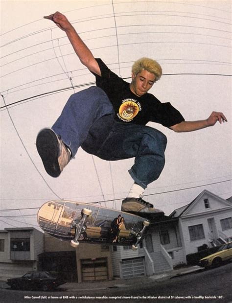 A Man Flying Through The Air While Riding A Skateboard In Front Of A House