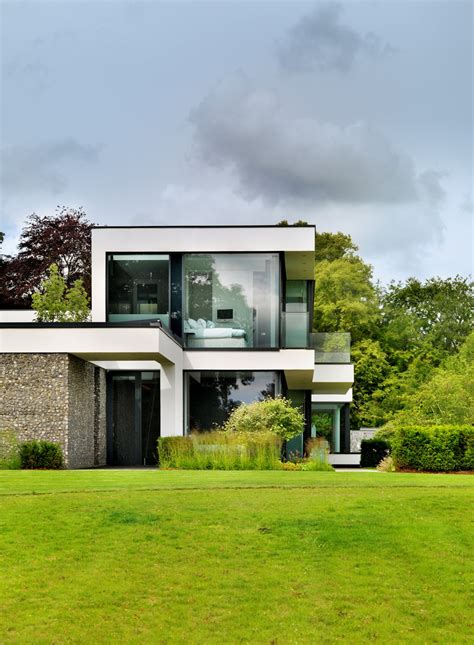 The house is a haven where the family members live, cook, lose sight of, and play. A Modern Country House by Gregory Phillips Architects | Architecture & Design