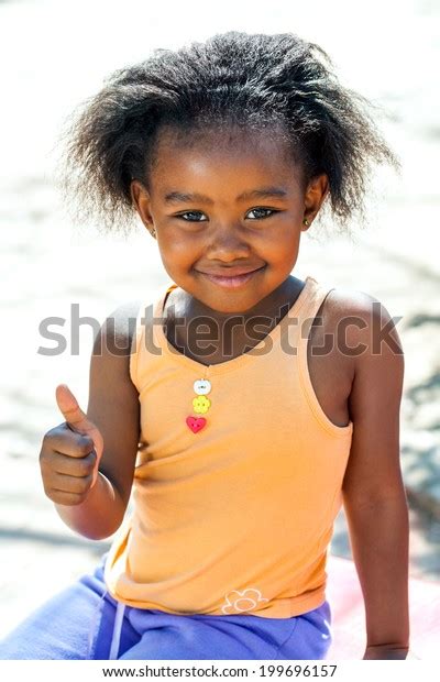 Outdoor Portrait Cute African Girl Doing Stock Photo 199696157