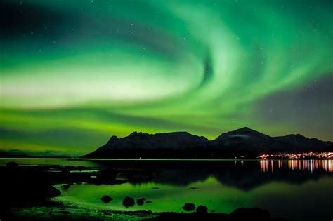 The aurora often reflects off the lake, providing a special mirrored perspective of nature's light show. The Best Time To See Northern Lights In Norway ...