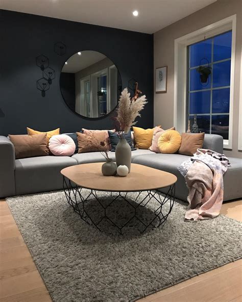 Your living room has a visual appeal which is why you should equip your room with stylish and comfortable… - colour scheme- navy wall, mustard blush pink highlights ...
