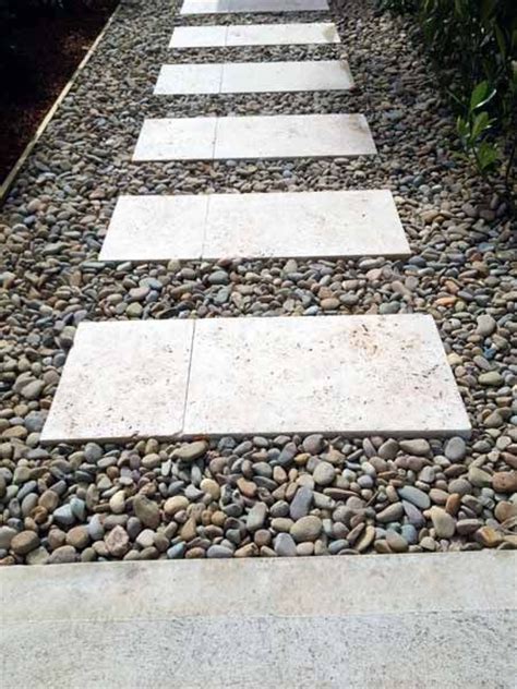 Garden paths come in all shapes and sizes, many of them easy enough to accomplish in a using bricks as pavers is an easy path solution, one that looks great in any yard or garden. Travertine stepping stones. Beautiful modern looking ...