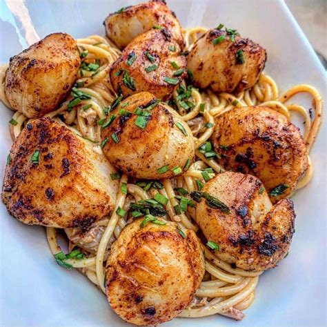 Insert the link by tapping on the 'insert link' icon. JAMAICAN JERK JUMBO SCALLOPS ON GARLIC CLAM PASTA | Clam pasta
