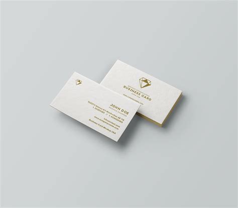 The clean elegant business card template focuses on color combinations and symmetry. Classy Diamond Emblem Business Cards - Admission By Design