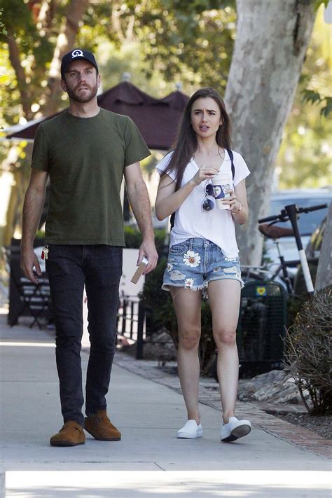 Lily Collins And New Boyfriend Charlie Mcdowell Wrap Arms Around Each