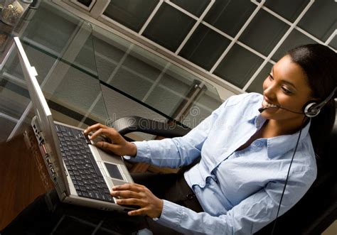 Friendly Customer Service Rep Stock Photo Image Of Typing Desk 2394330