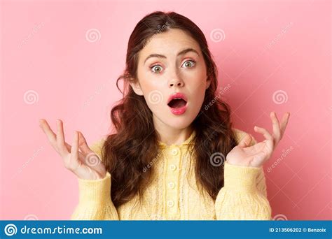 Close Up Of Surprised And Confused Young Woman Open Mouth And Raise