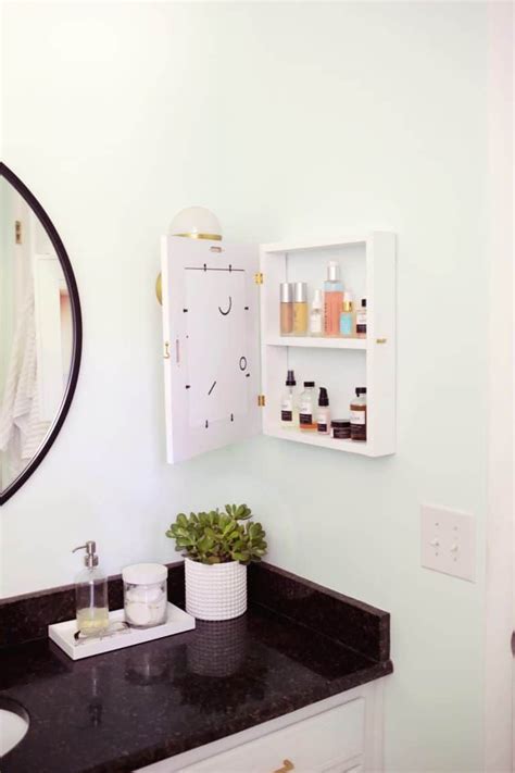 We took an empty wall in our bathroom and created a recessed. Hidden Medicine Cabinet DIY | Bathroom wall cabinets ...