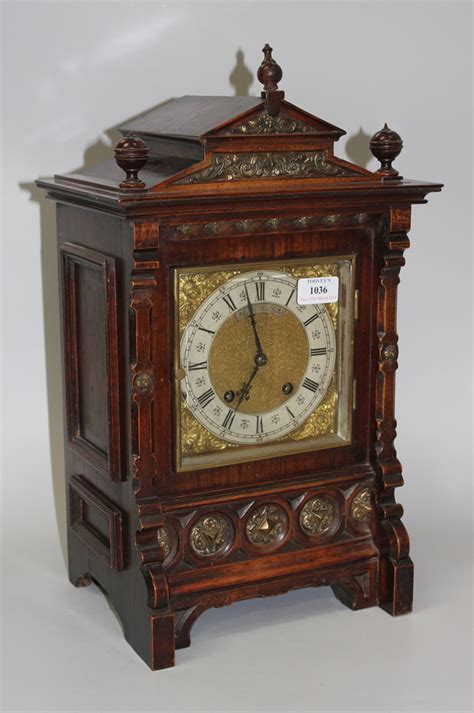 A Late 19th Century Walnut Mantel Clock With Eight Day Movement