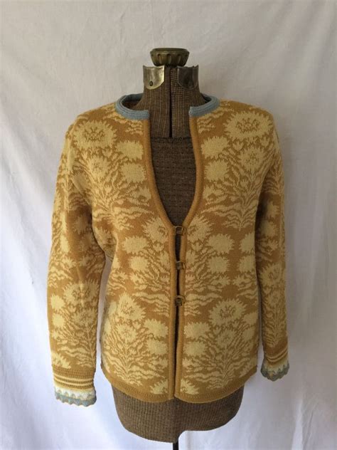 Rather orange blossom orange blossoms in a floral pattern looks pleasing. Oleana Norway Norwegian floral knit wool cardigan sweater ...
