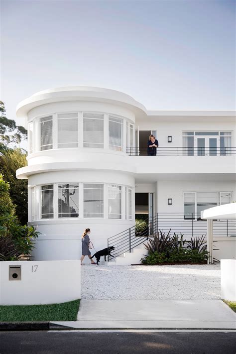 Exterior Shot Of A Renovated White Art Deco Style Home On Sydneys