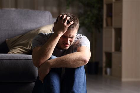 Sad Man Lamenting At Home Stock Photo Download Image Now