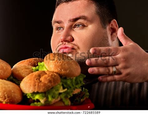 Fat Man Eating Fast Food Hamberger Stock Photo 722685589 Shutterstock