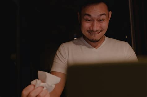 Premium Photo Funny Horny Face Of Asian Man Watching Porn At Night