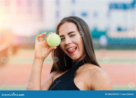 Beautiful Stylish Woman In Trendy Sportswear On Tennis Court Stock
